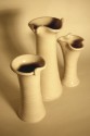Three Vases - white earthenware, approx 19cms (click to enlarge)